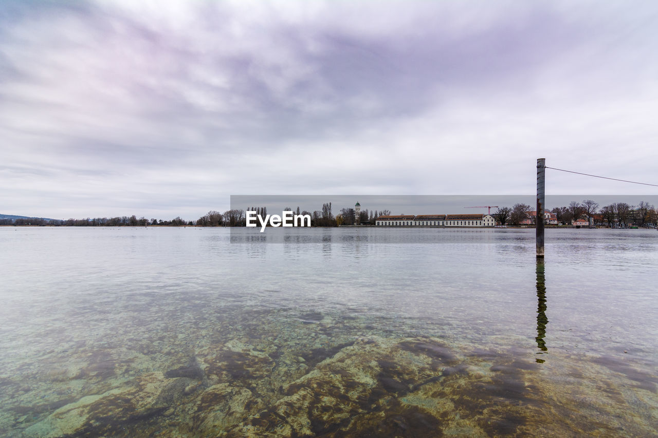 SCENIC VIEW OF LAKE BY SKY AGAINST CLOUDS