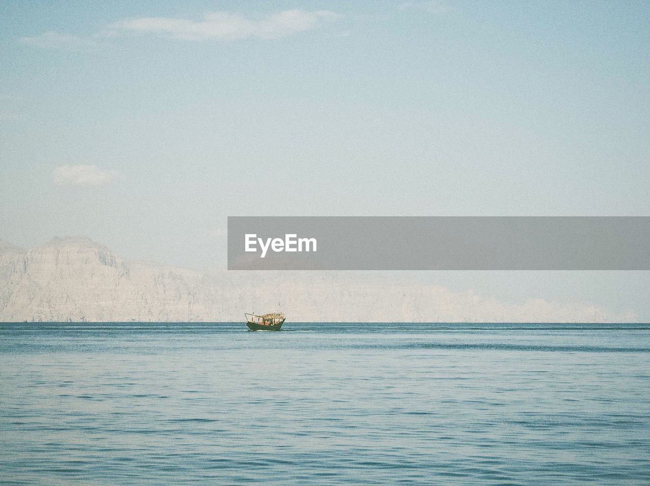 Boat on sea against sky