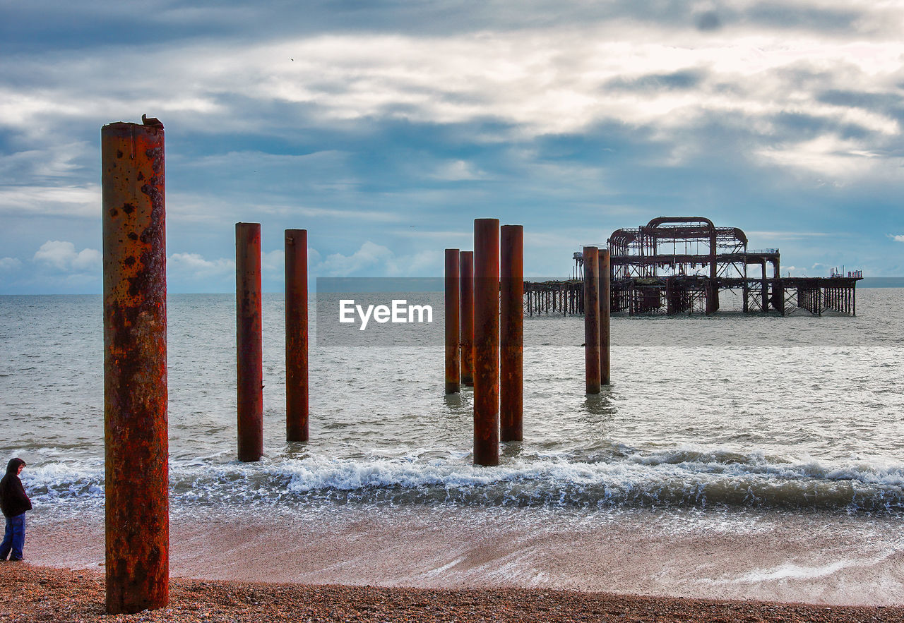 Brighton west pier. after it was burned down. now unconnected to the shore. posts in the foreground