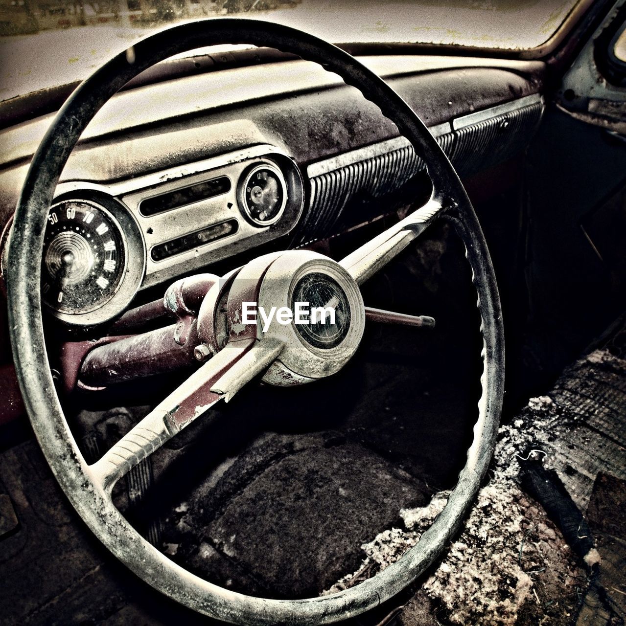 Close-up view of steering wheel in obsolete car