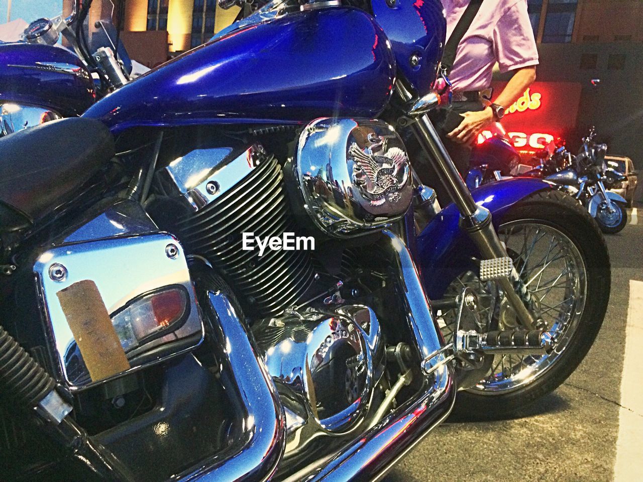 MIDSECTION OF BLUE MOTORCYCLE