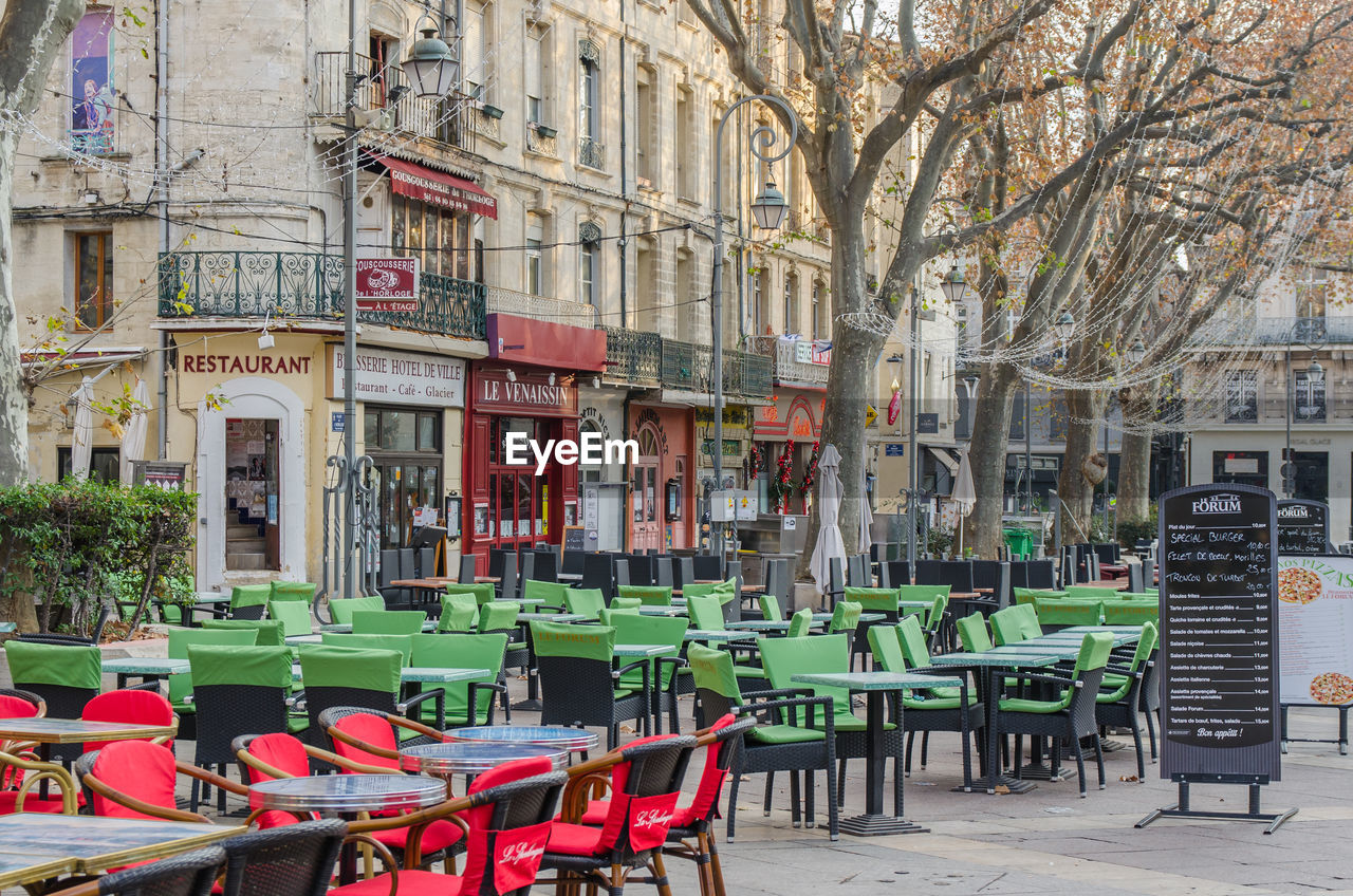 CHAIRS AND TABLES ON RESTAURANT