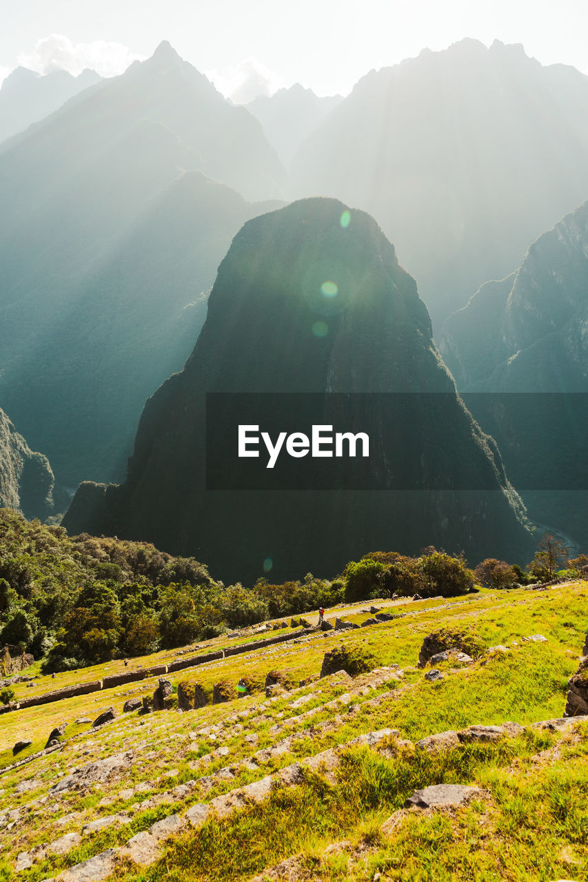 Machu picchu old inca ruins at sunrise in peru