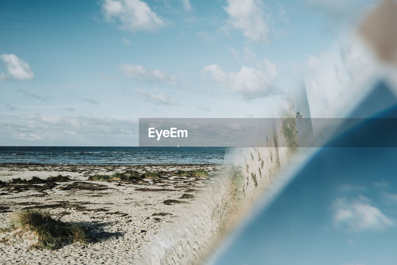 PANORAMIC SHOT OF SEA AGAINST SKY