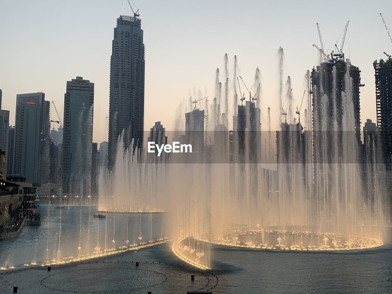 Panoramic view of modern buildings in city against sky