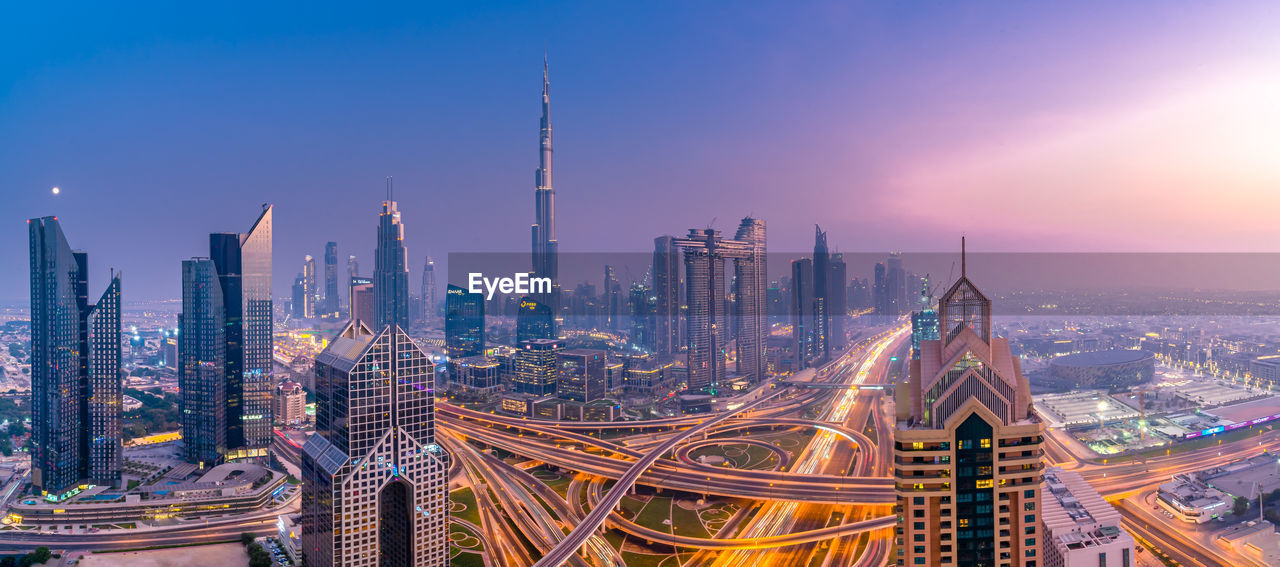 Panoramic view of city buildings against sky