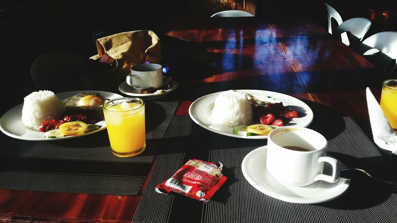 CLOSE-UP OF BREAKFAST SERVED ON TABLE WITH TEA