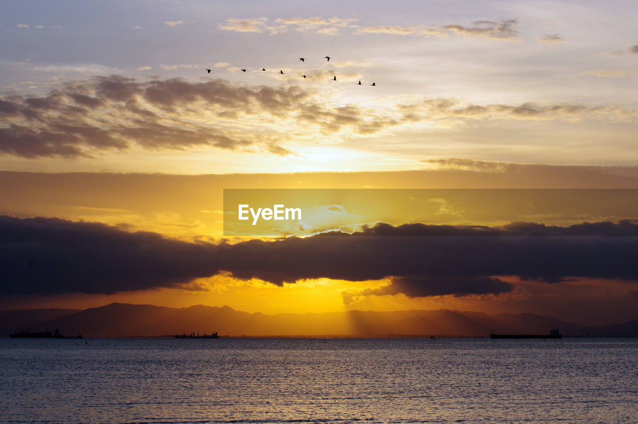 Scenic view of sea during sunset