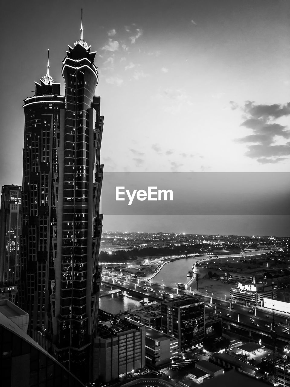 HIGH ANGLE VIEW OF CITY BUILDINGS AGAINST SKY