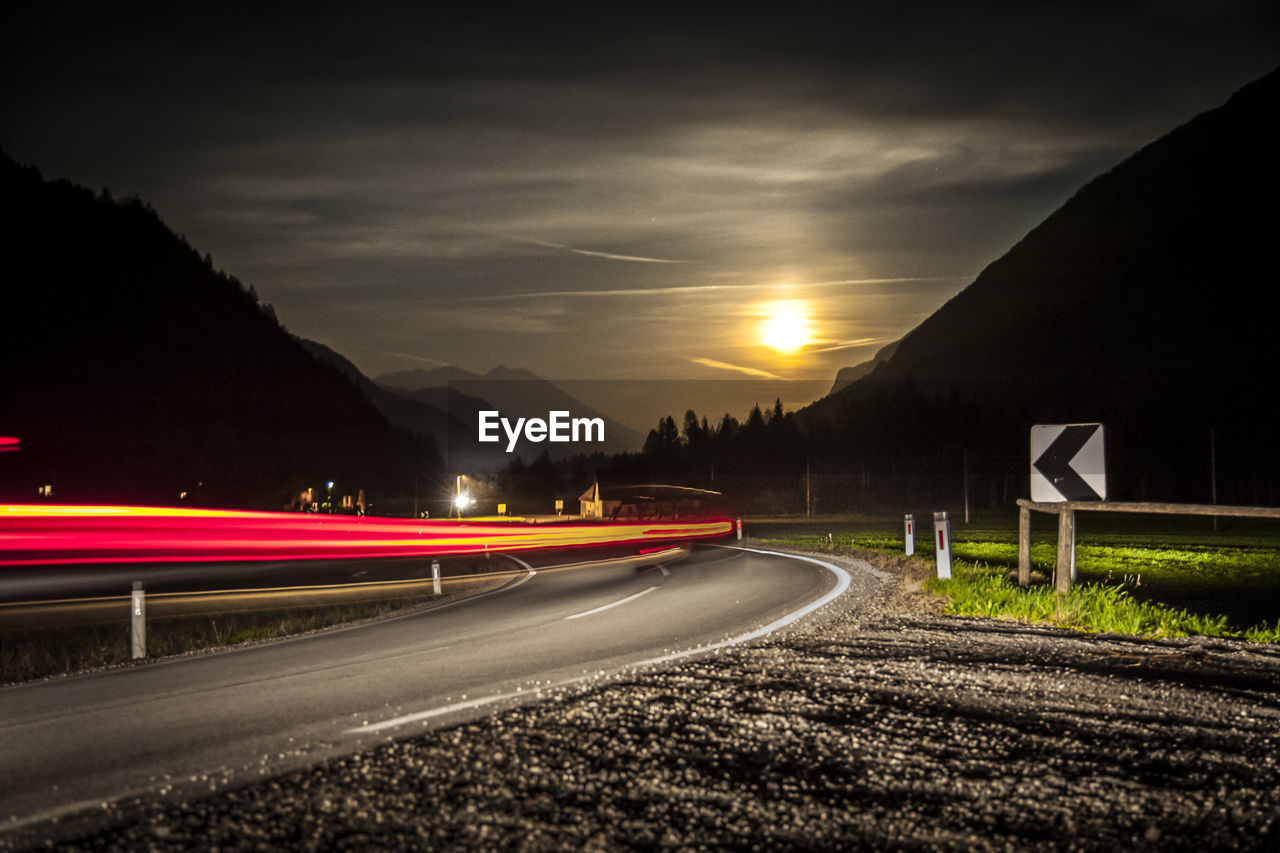 Light trails on road at night