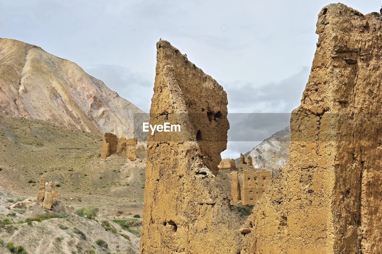 Low angle view of old ruins against sky