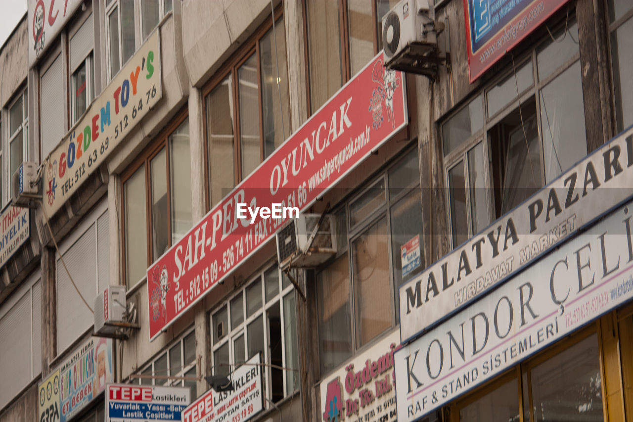 LOW ANGLE VIEW OF SIGN BOARD