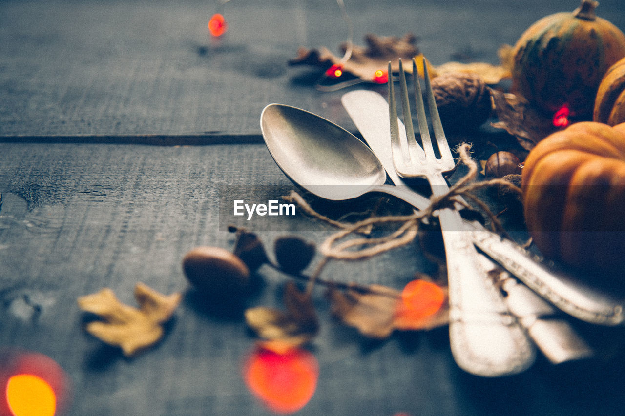 CLOSE-UP OF FOOD ON TABLE AGAINST WALL