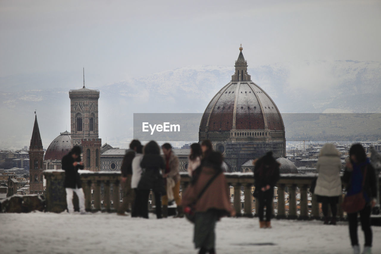 People against florence cathedral in city