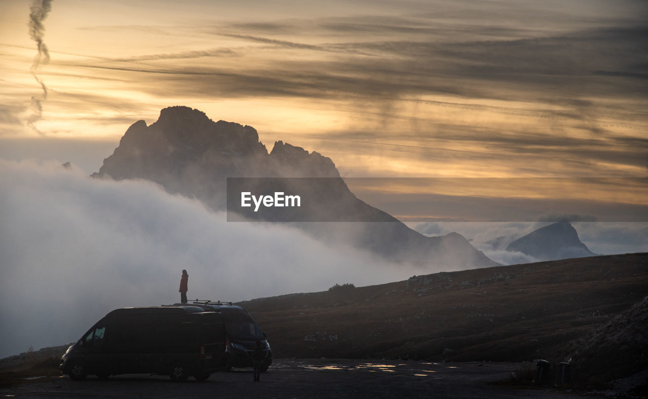 Scenic view of mountains against sky during sunset