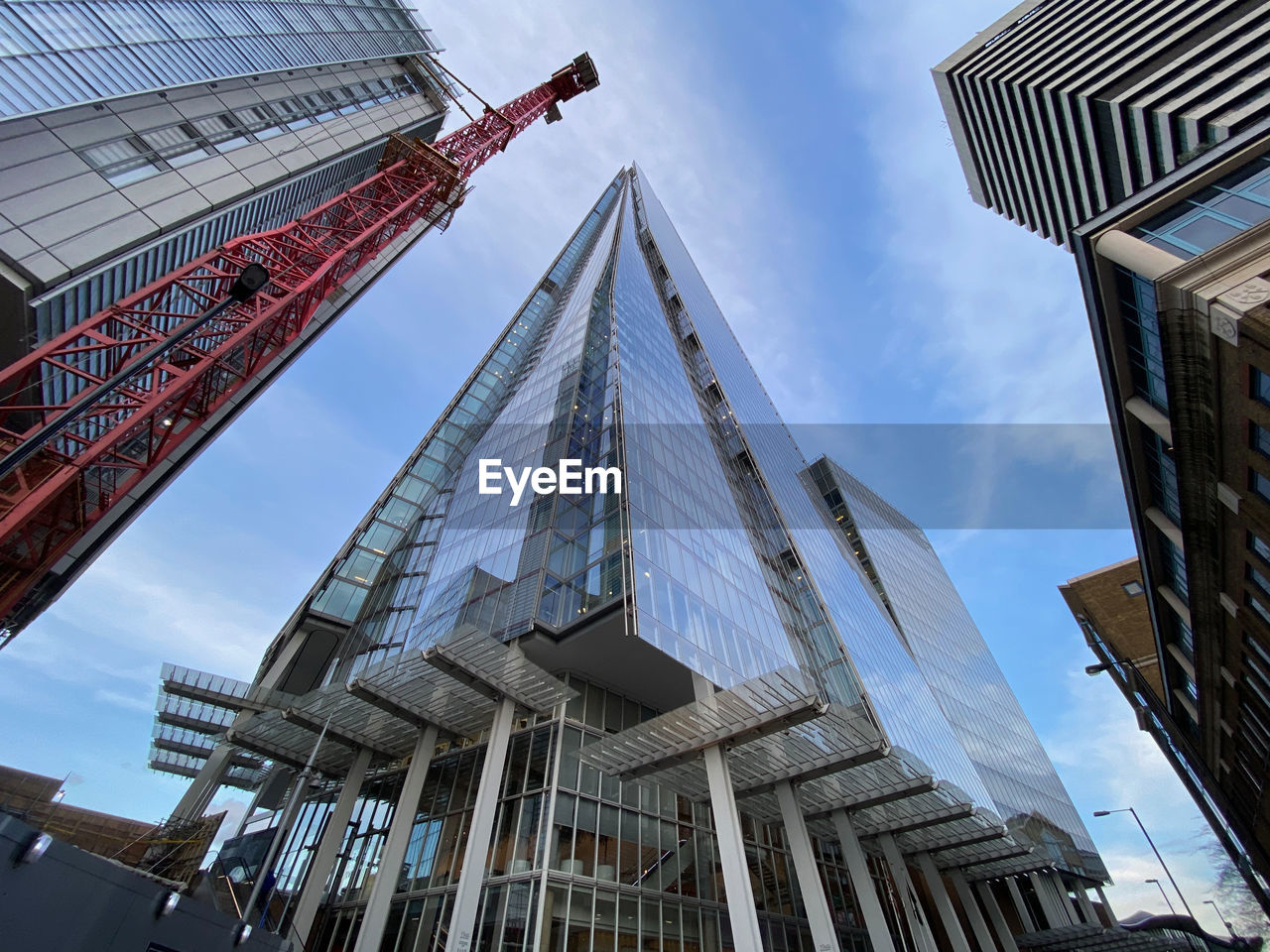 Low angle view of modern buildings against sky