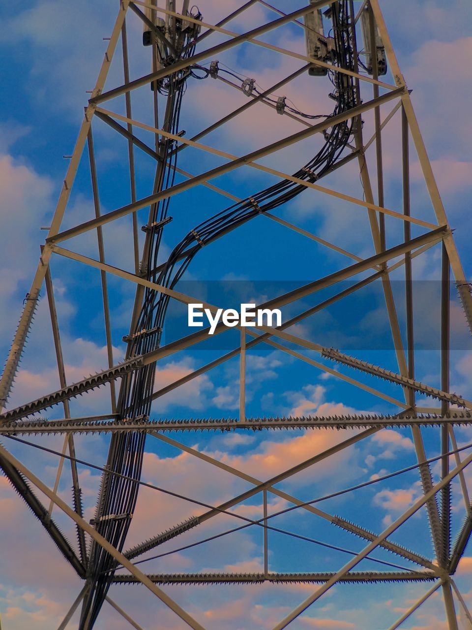 Low angle view of metallic structure against sky