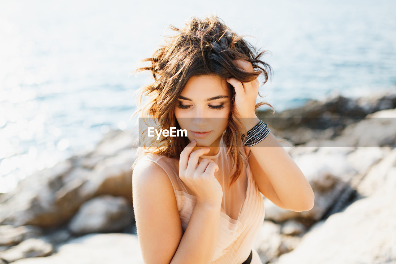 Portrait of beautiful woman at beach