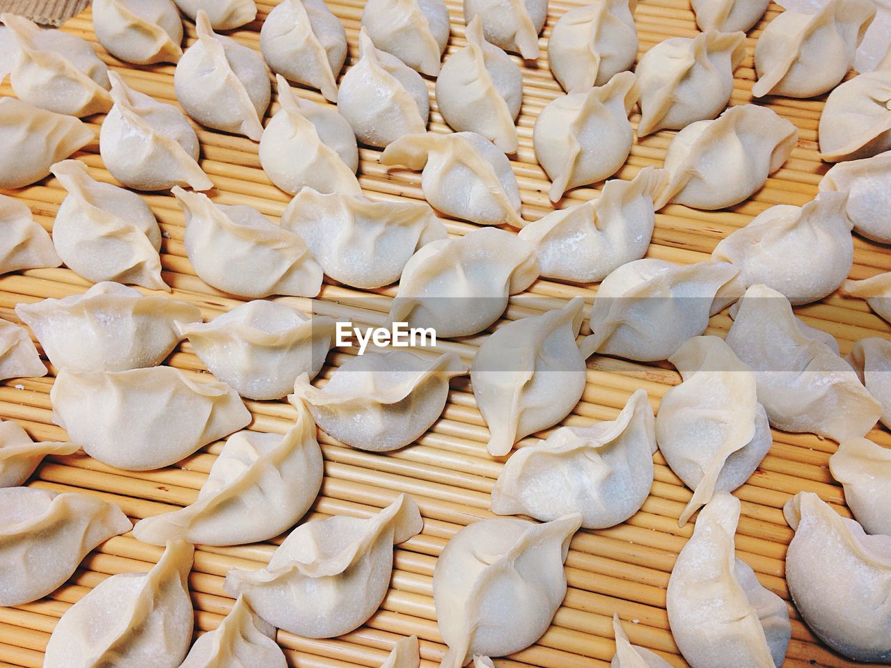 Full frame shot of dumplings in wood