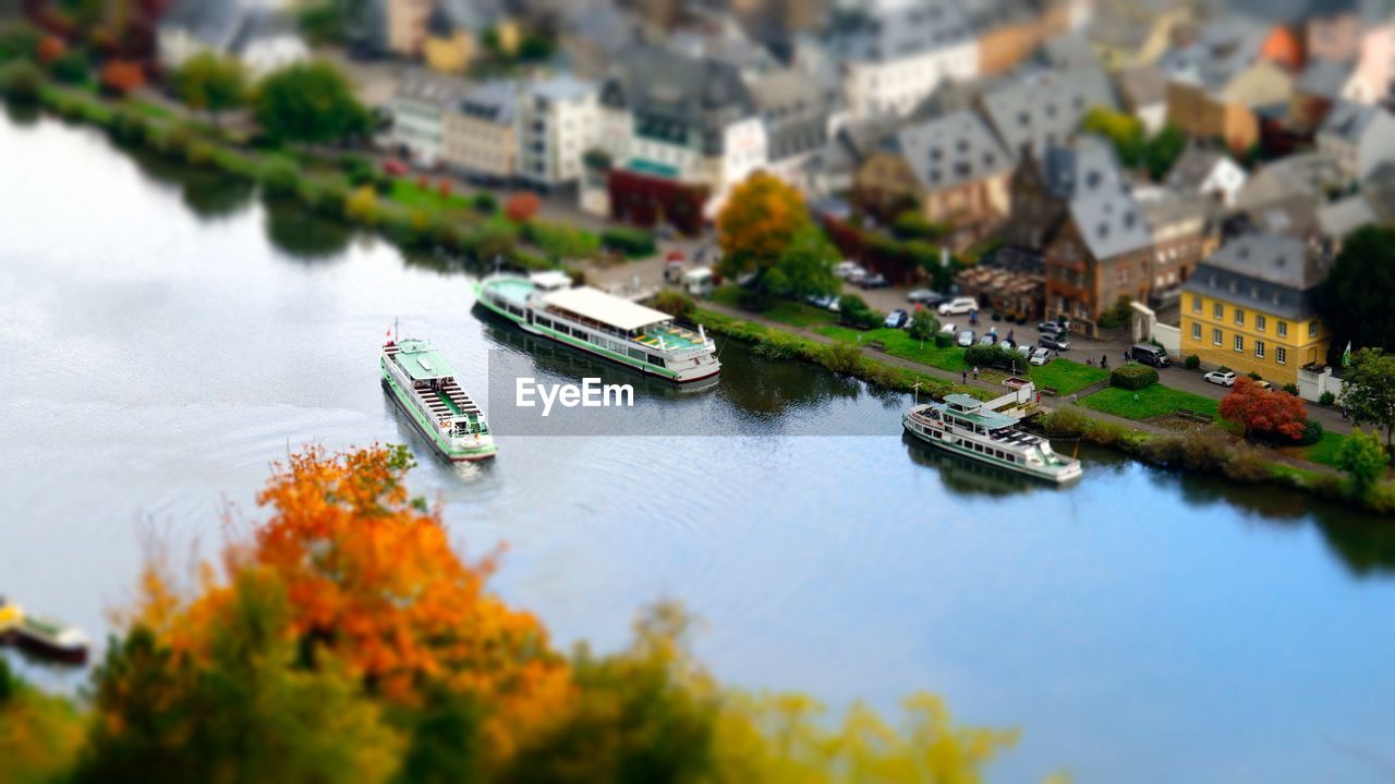 HIGH ANGLE VIEW OF SHIP IN RIVER