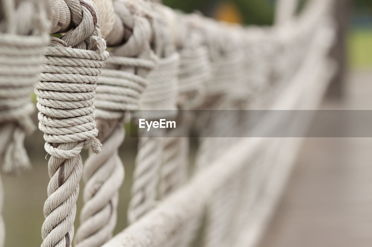 Close-up of rope railing