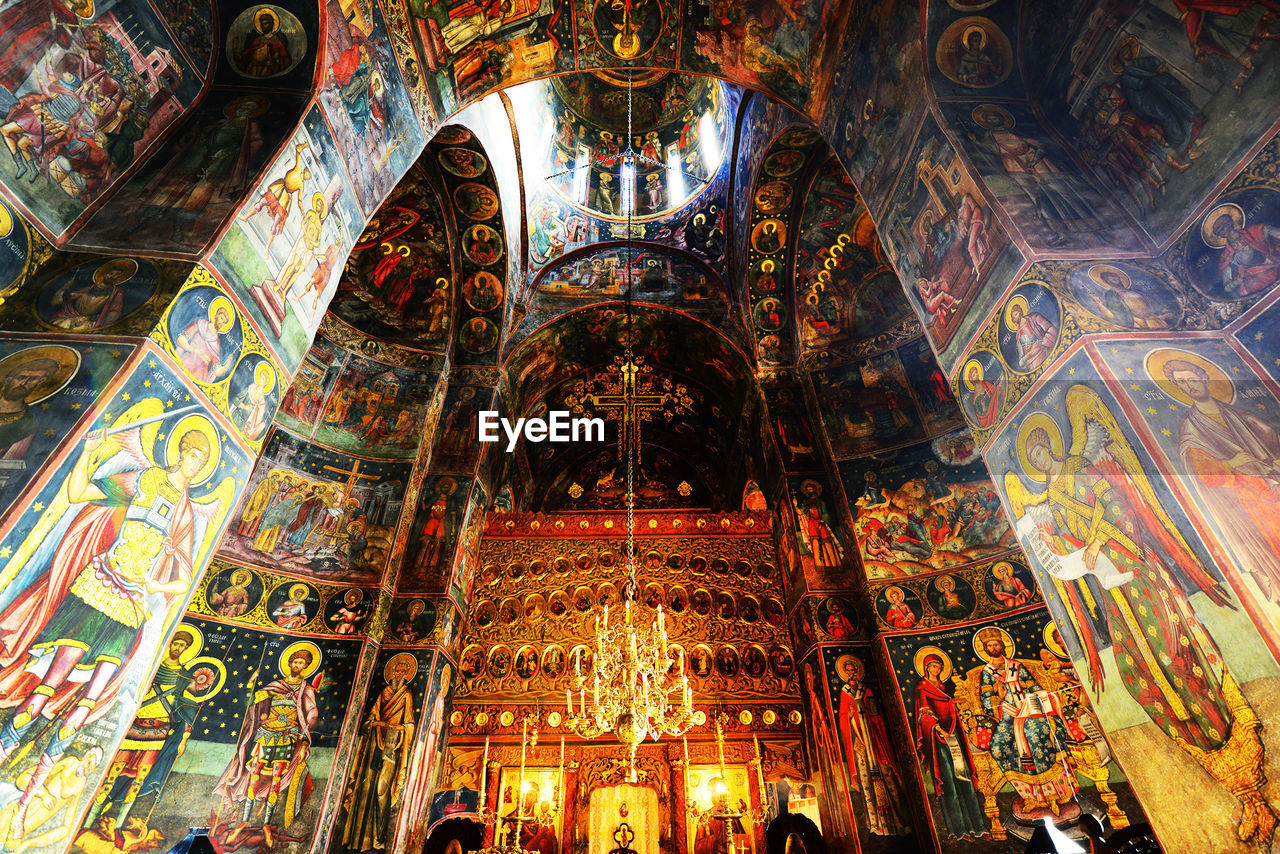 LOW ANGLE VIEW OF ILLUMINATED LIT UP TEMPLE