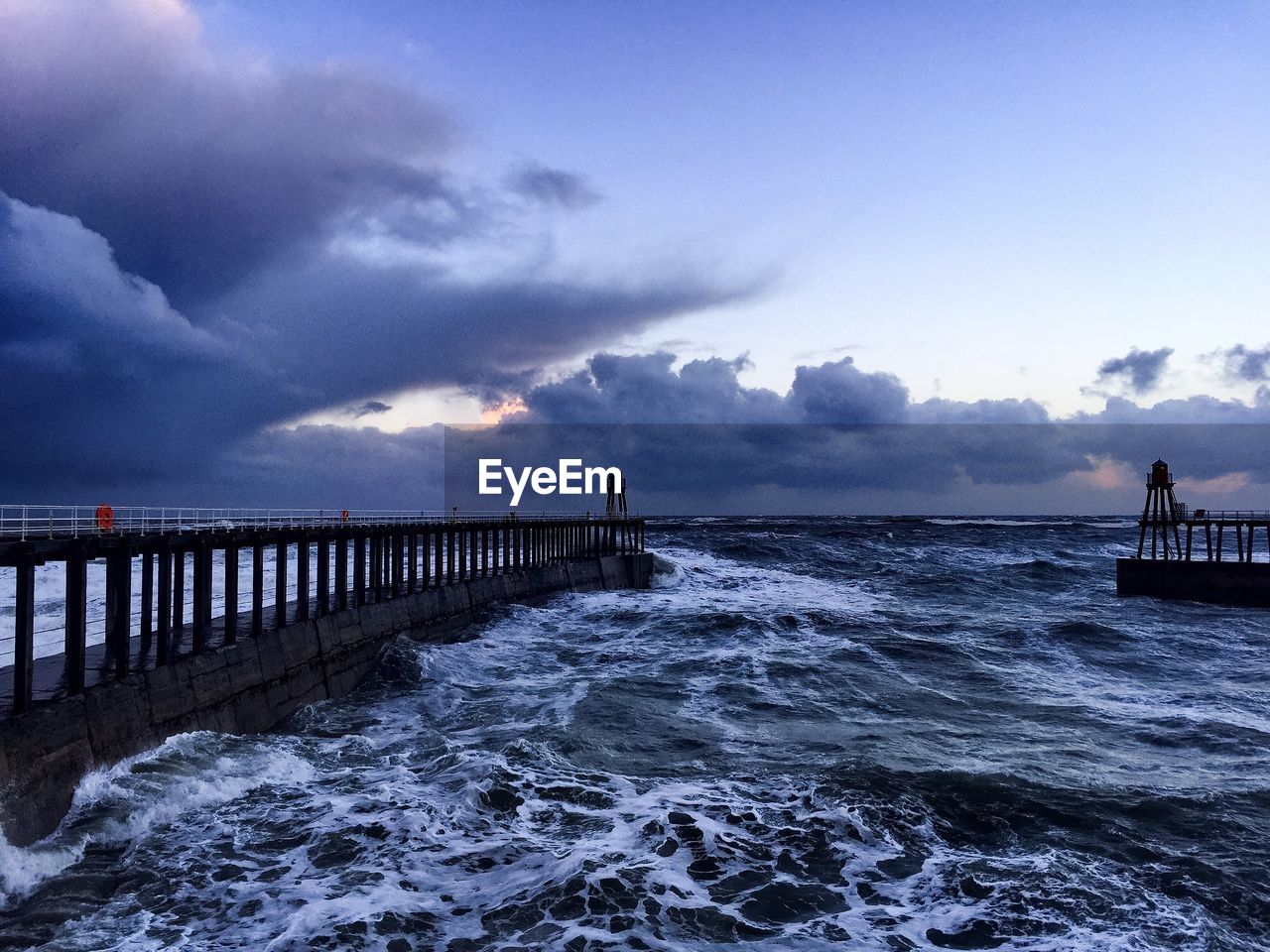 Scenic view of seascape against cloudy sky