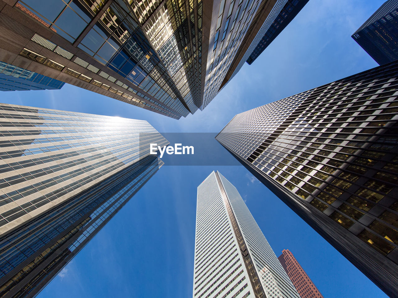 LOW ANGLE VIEW OF BUILDINGS AGAINST SKY