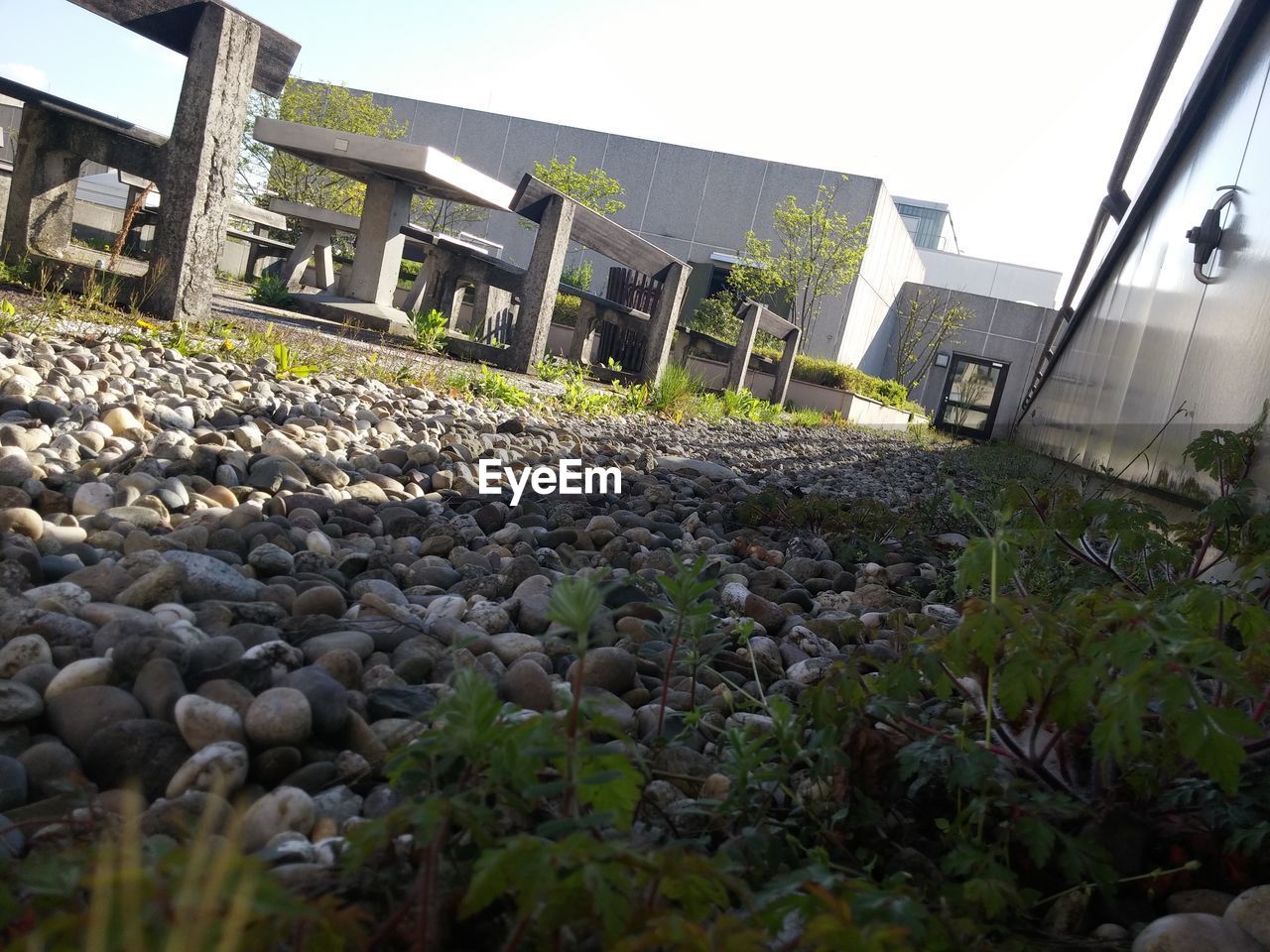 Tilt image of building against clear sky