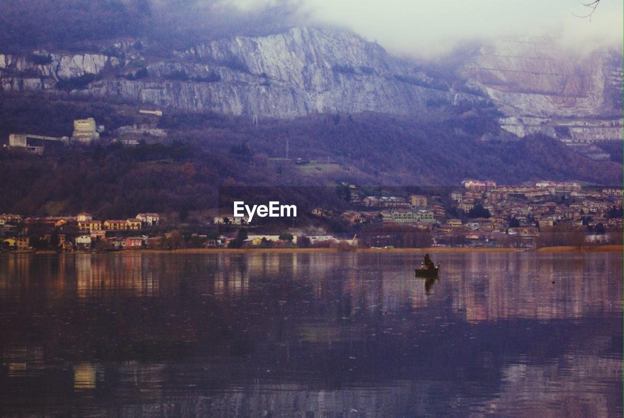 SCENIC VIEW OF RIVER AND TOWN