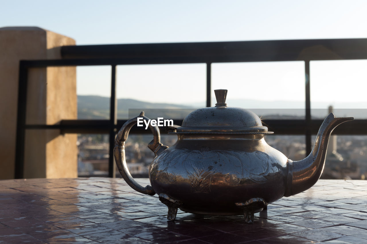 Close-up of teapot on table