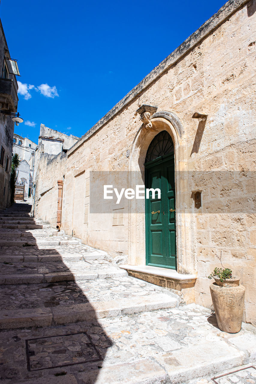 Stairway with entrance of historic building in matera south italy