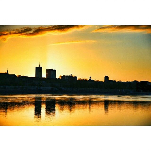 VIEW OF RIVER AT SUNSET