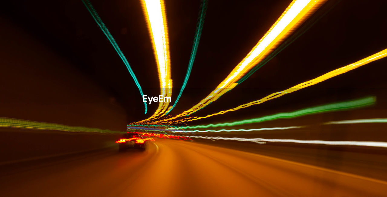 Light trails on road at night