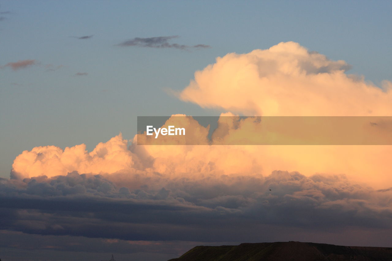 Low angle view of dramatic sky during sunset