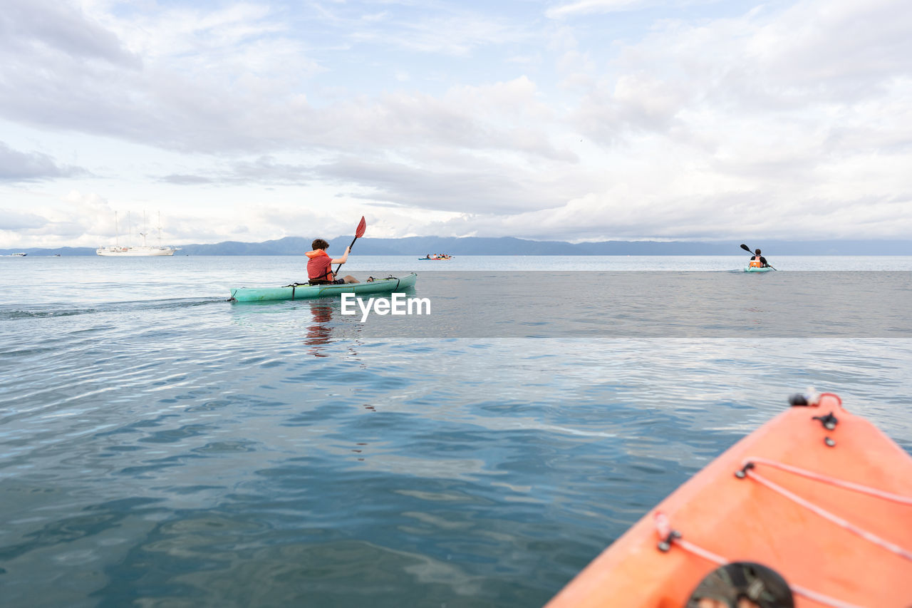 Teen boy kayaking in costa rica