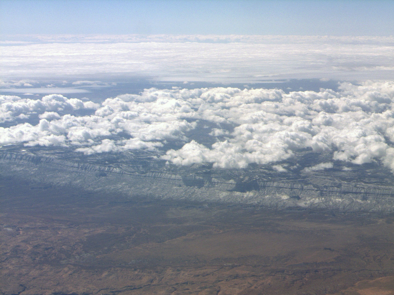 AERIAL VIEW OF CLOUDS OVER LANDSCAPE