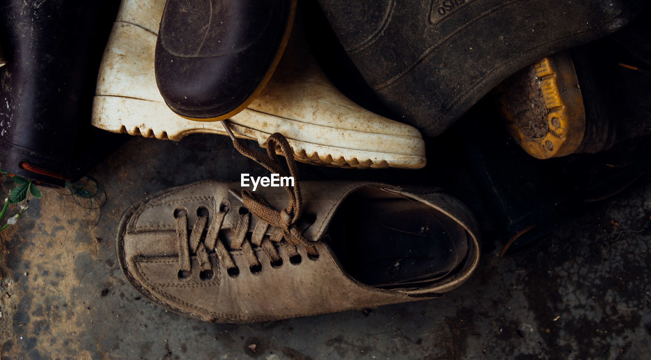 High angle view of abandoned shoes