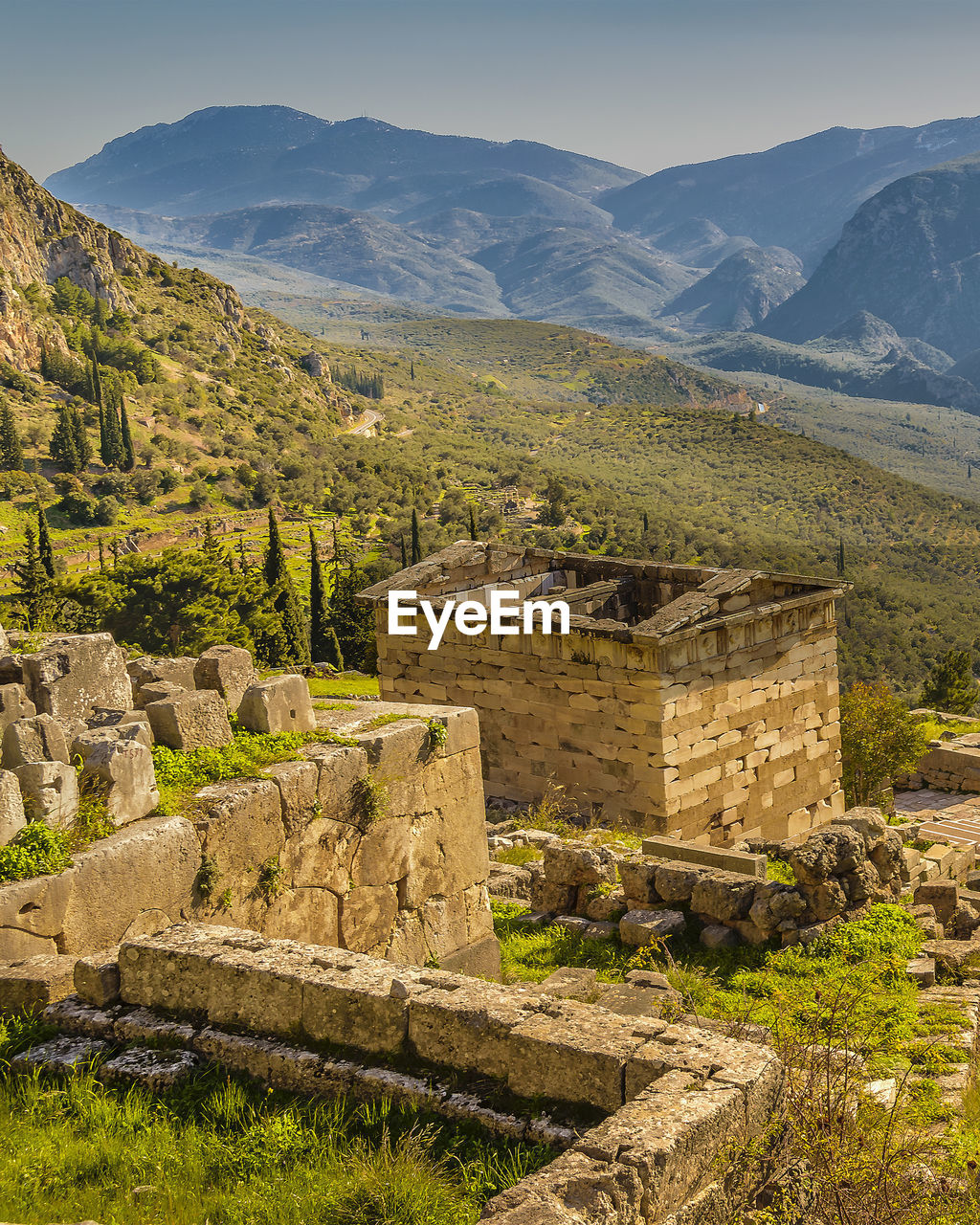 mountain, history, the past, ancient, architecture, landscape, mountain range, scenics - nature, environment, travel destinations, nature, old ruin, travel, land, sky, valley, built structure, plant, no people, old, ancient civilization, tourism, ruins, beauty in nature, building, outdoors, village, building exterior, archaeology, stone material, rock, tree, ancient history, wall, rural area, tranquility, day, plateau, fort, ruined, tranquil scene, rural scene, clear sky, grass