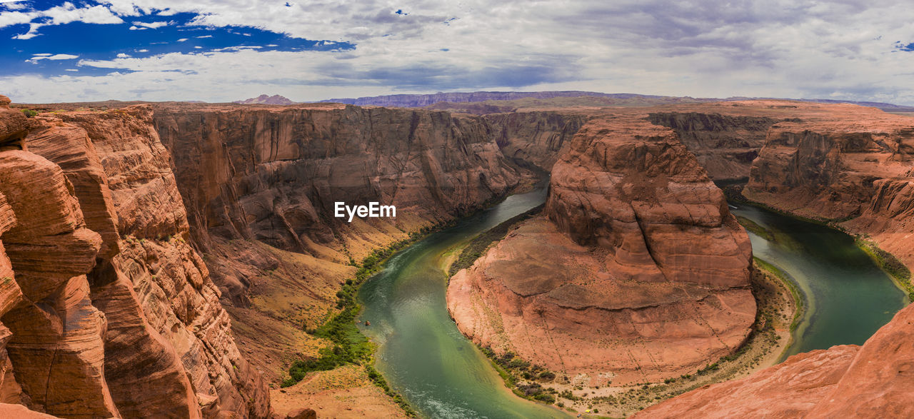 The horseshoe bend near page in the us state of arizona on a summer day with lots of colors