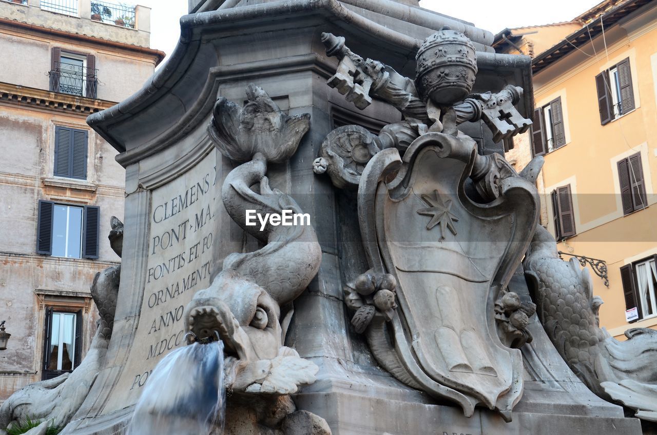 LOW ANGLE VIEW OF STATUES