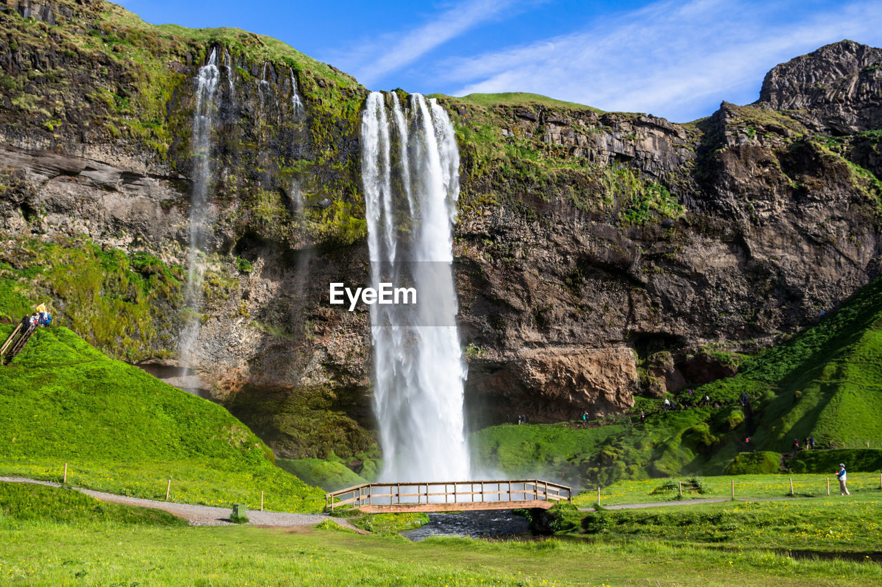 The imposing seljalandfoss waterfalls of iceland are spectacular in summertime