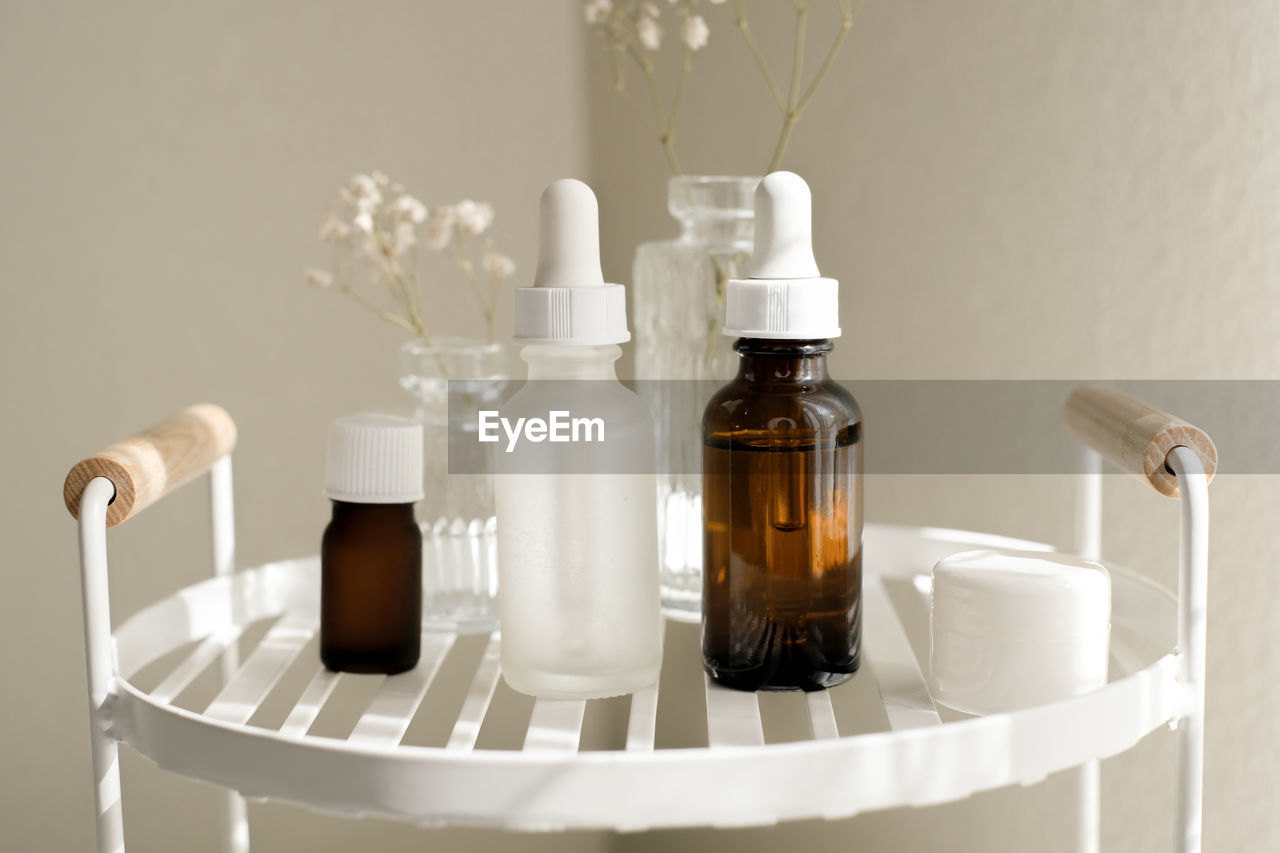 high angle view of medicines in bottles on table