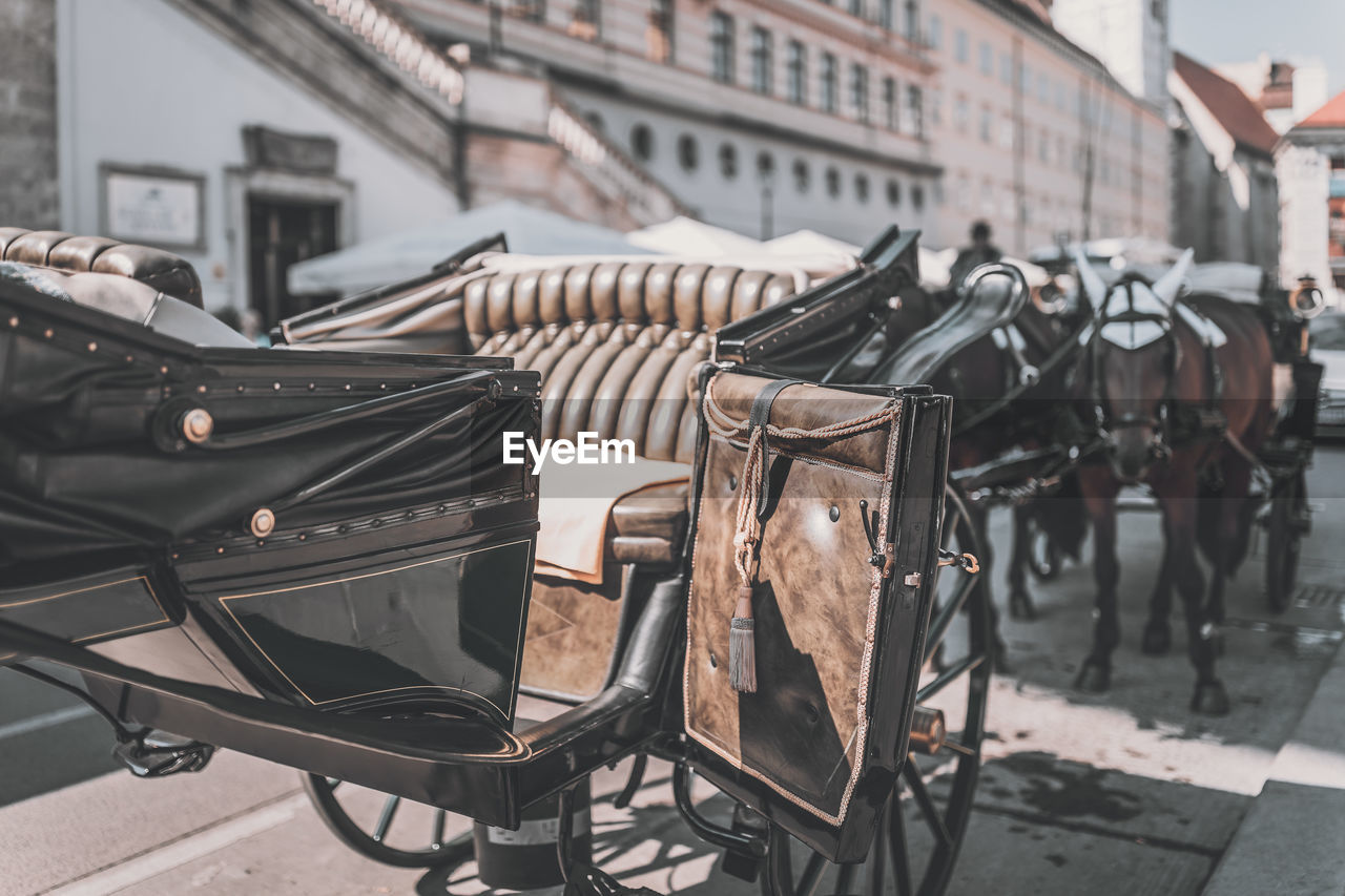 VIEW OF BICYCLES PARKED ON STREET IN CITY