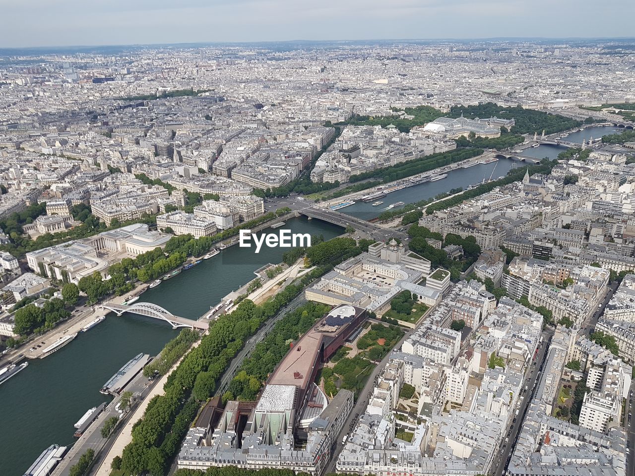 High angle view of river amidst buildings in city