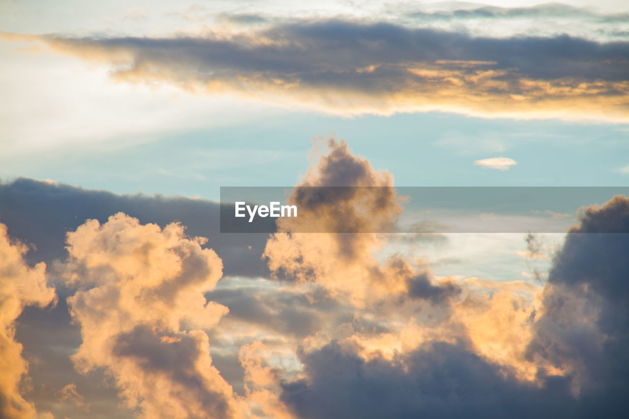 LOW ANGLE VIEW OF CLOUDY SKY DURING SUNSET