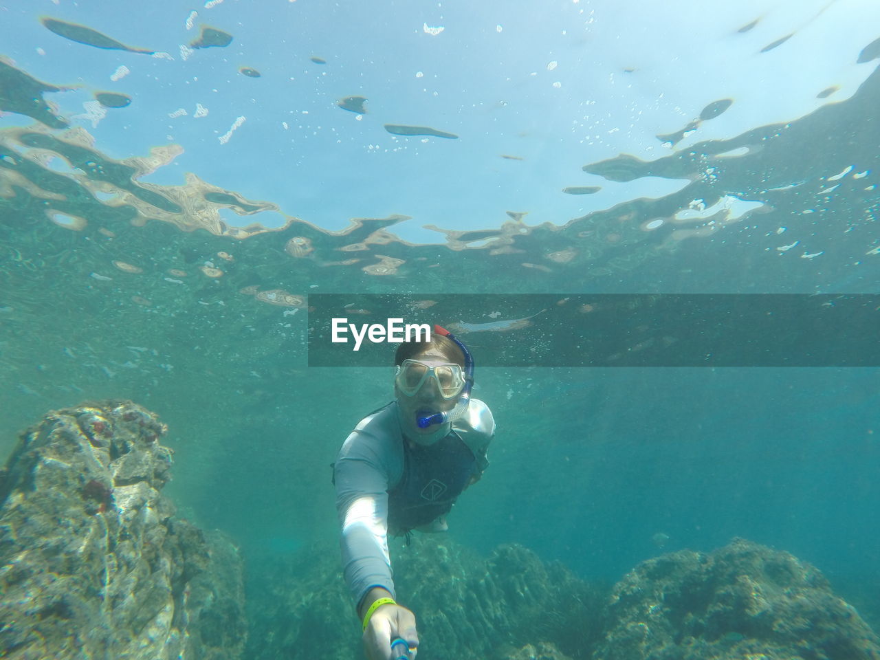 Portrait of man swimming undersea