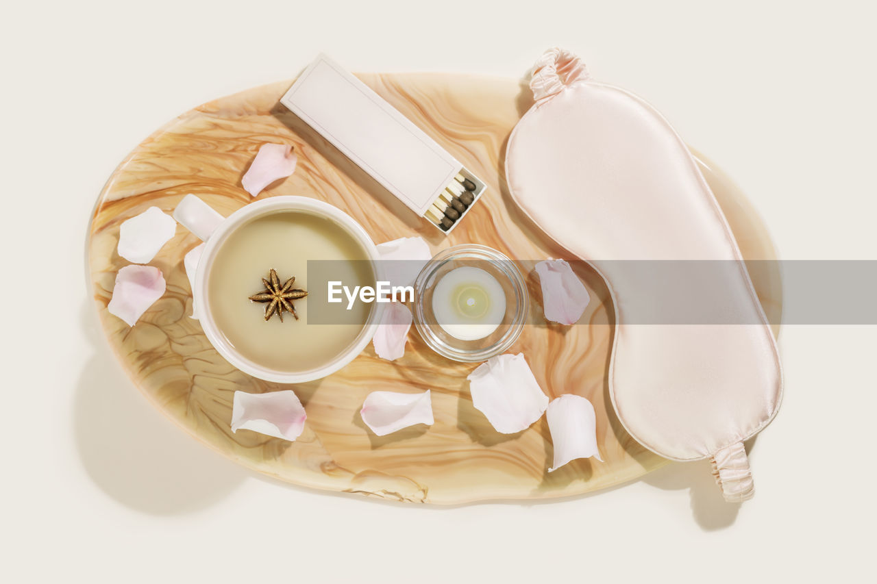 high angle view of coffee on pink background