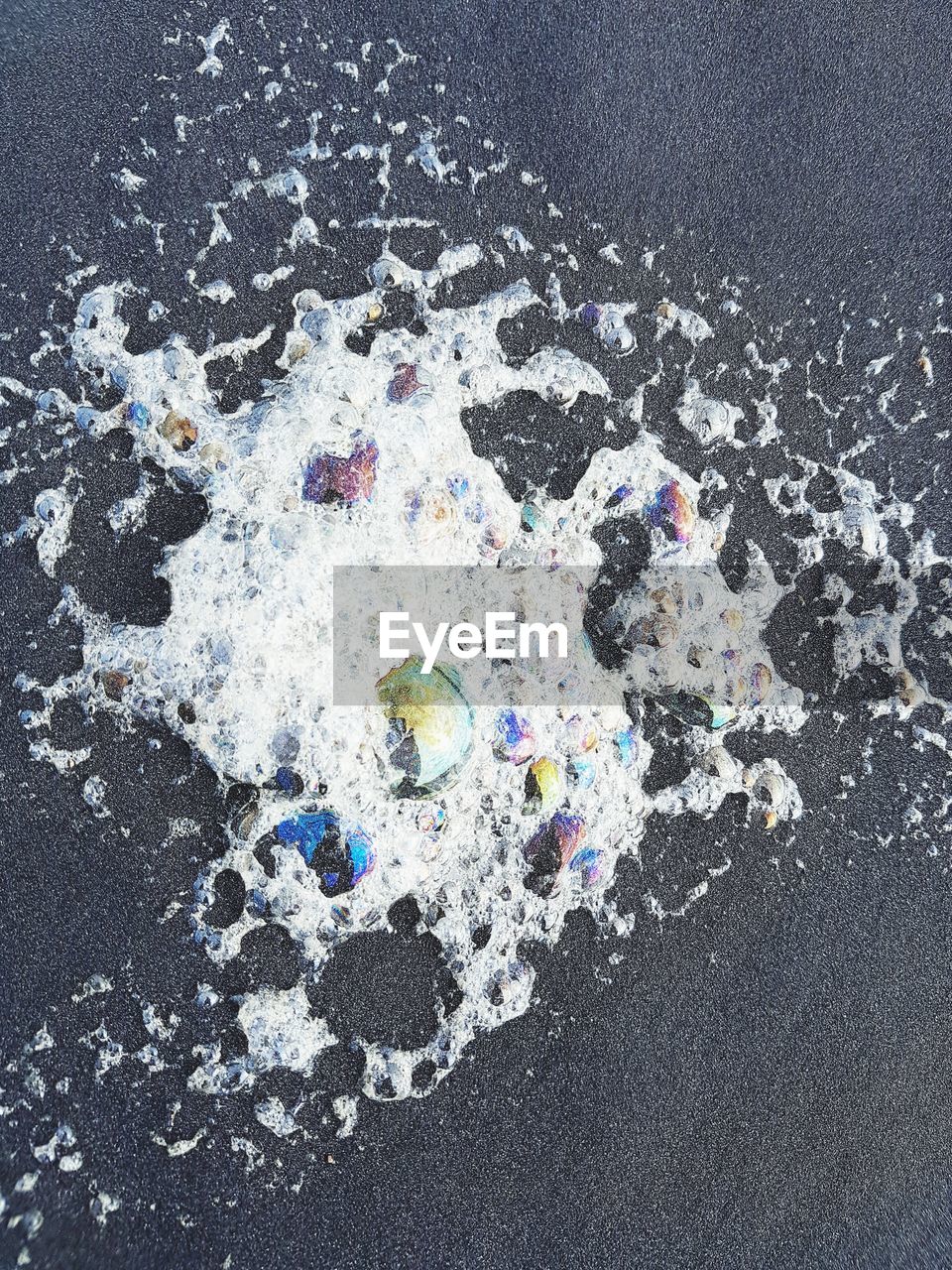 HIGH ANGLE VIEW OF MULTI COLORED LIGHTS ON ROAD