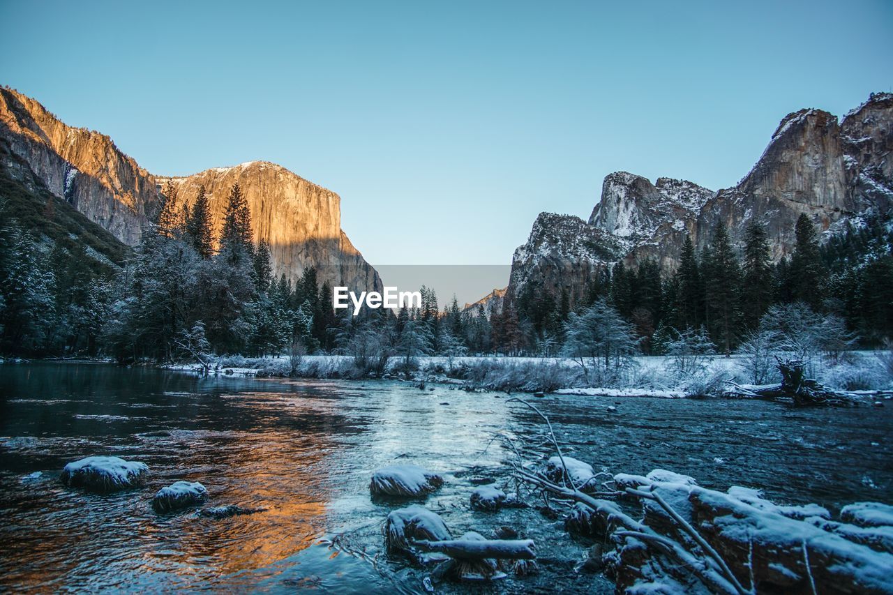 Scenic view of mountains against sky during winter